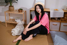 Foot Joy Photography Issue 18: Model Breasts (Pairing: pink T-shirt, denim trousers, sneakers, white cotton socks, bare feet)